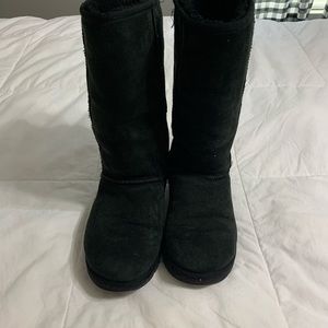 Tall black UGG boots